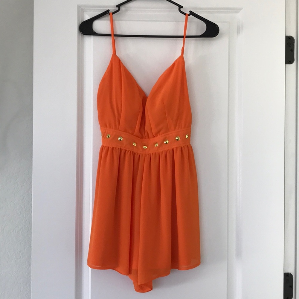 Cute orange romper with tags